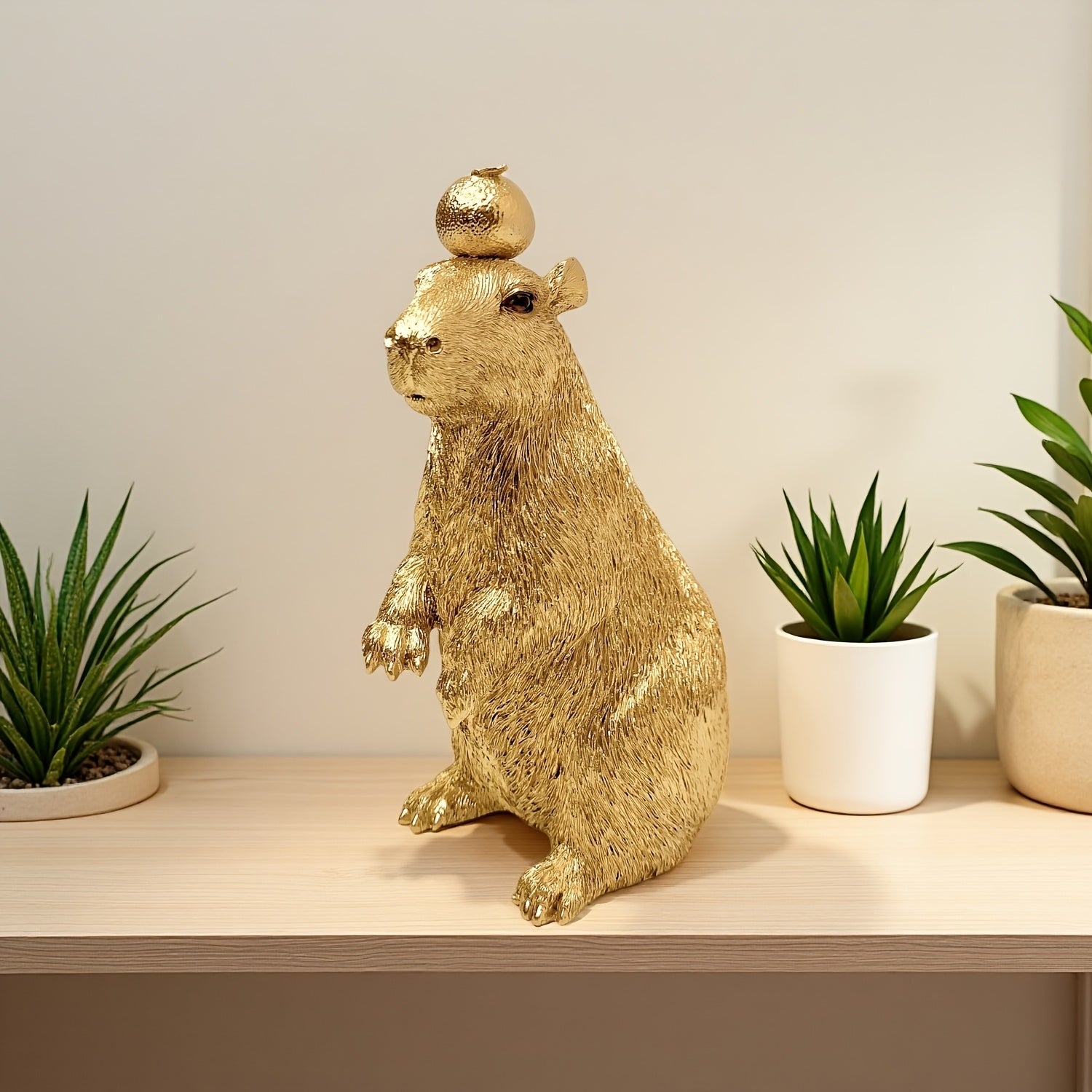 Tnessential Golden Capybara Statue with Orange on Head 3D Decor