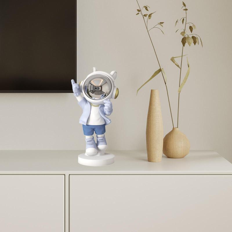 Tnessential Light Blue Astronaut Figurine Making a Heart Gesture 3D Decor